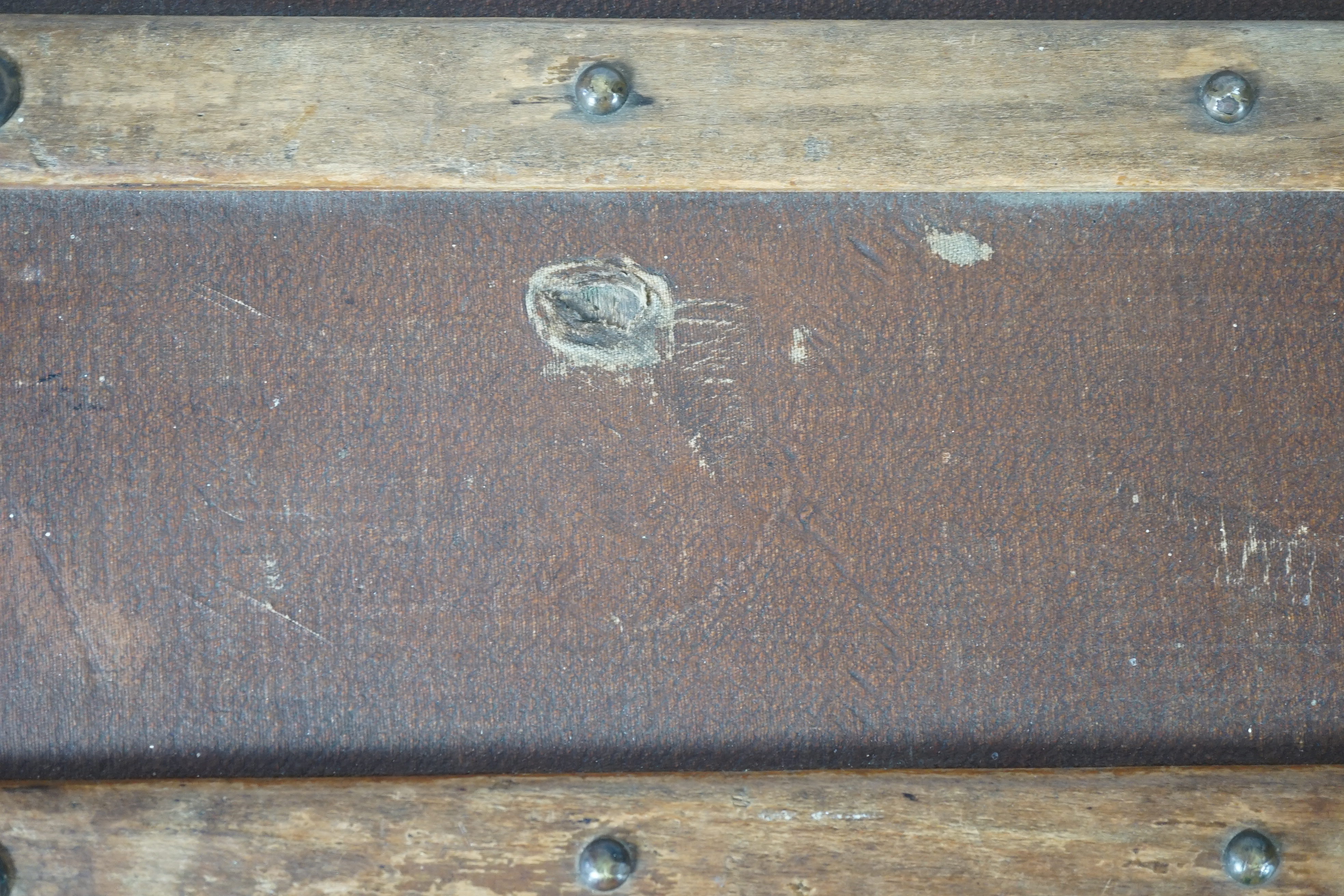 E. Goyard Aine, 233 Rue Saint Honore Paris, a late 19th or early 20th century canvas covered travelling trunk, brass mounted with ash batons, height 48cm, width 86cm, depth 49cm